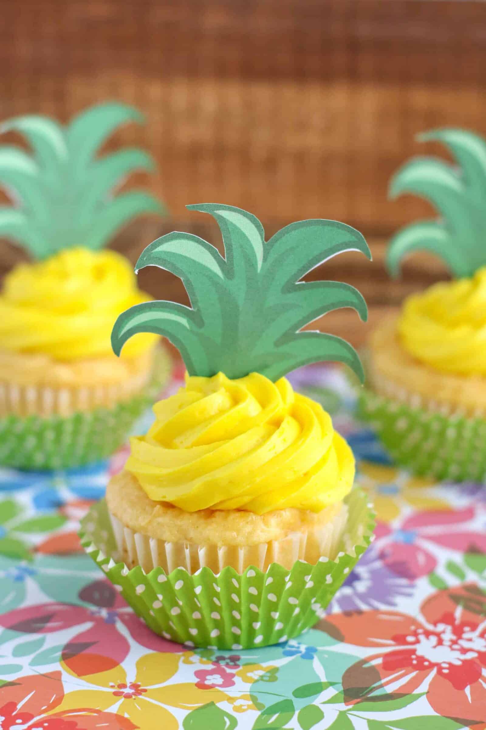 pineapple-cupcakes-with-free-printable-topper-about-a-mom for Free Printable Hawaiian Cupcake Toppers Pineapple Cupcakes with Free Printable Topper - About a Mom for Free Printable Hawaiian Cupcake Toppers