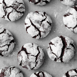 Chocolate Crinkle Cookies on a sheet pan shot from above