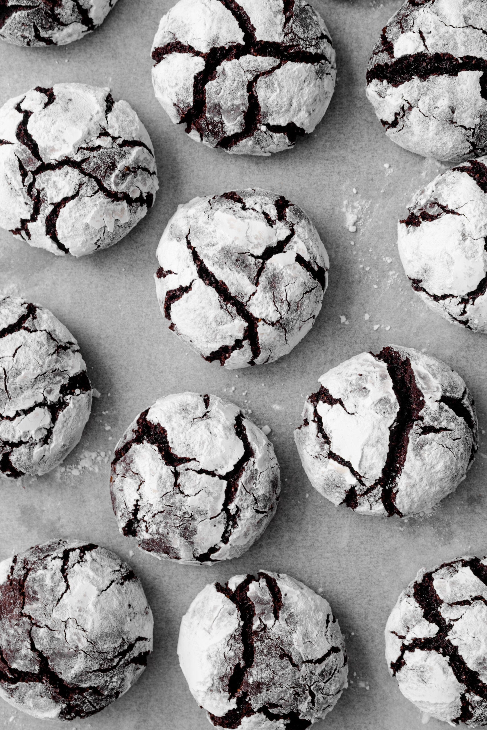 Chocolate Crinkle Cookies on a sheet pan shot from above