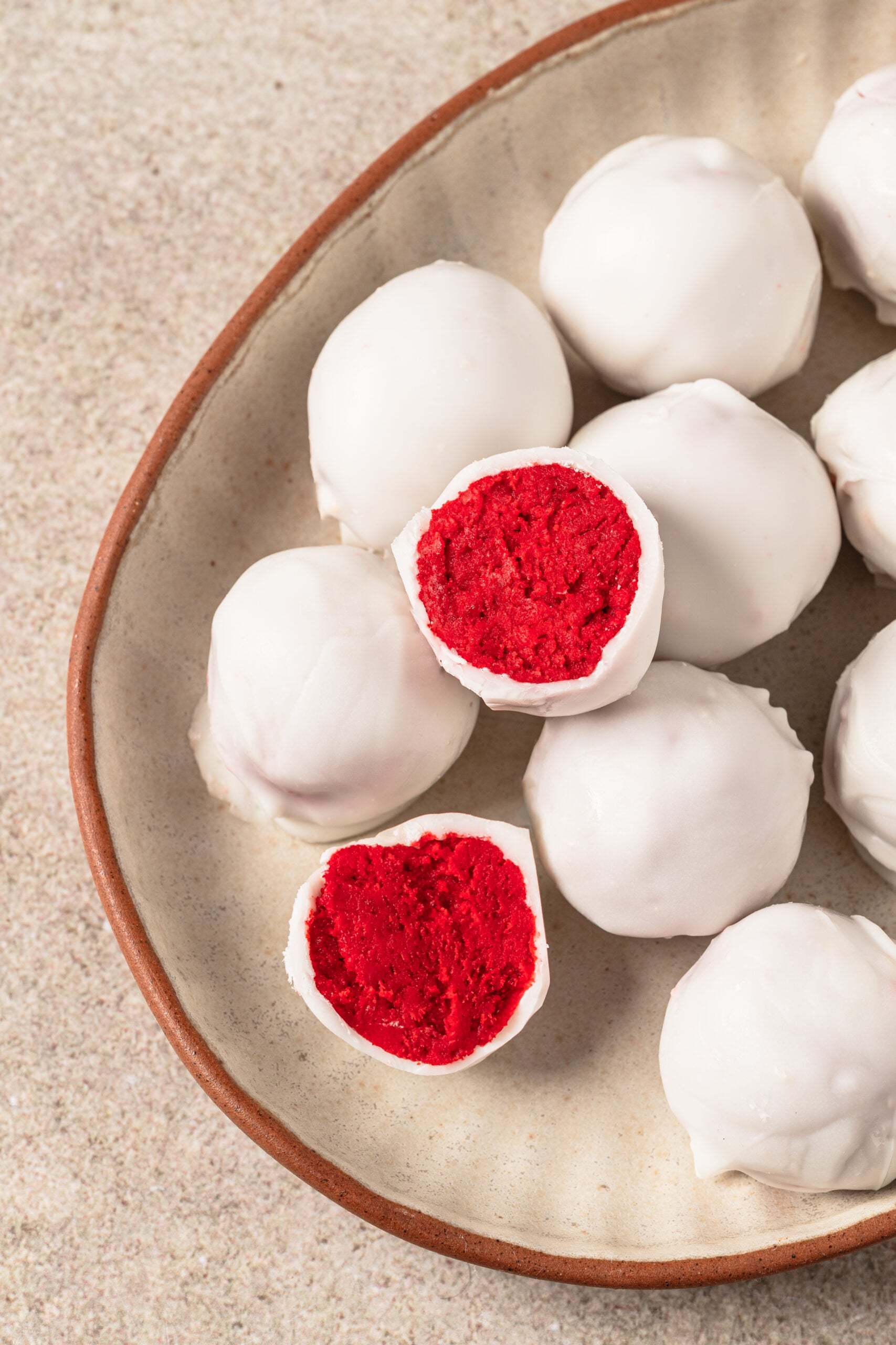Red Velvet Cake Balls on a plate shot from above