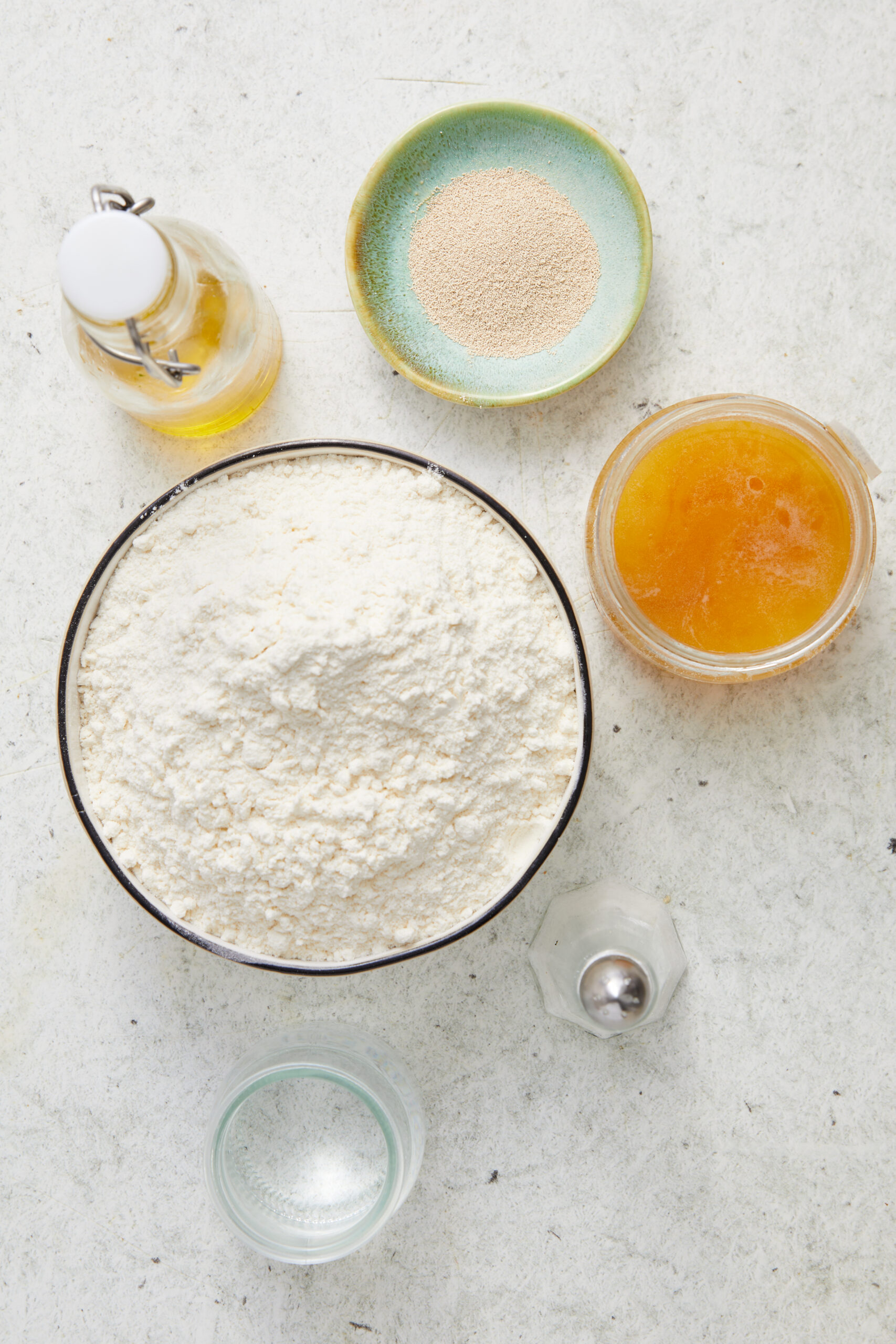 Ingredients for Air-Fryer Bread: all-purpose flour, instant yeast, honey, olive oil, warm water, and salt.
