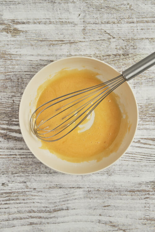 Whisking egg yolks and sugar for cr&egrave;me br&ucirc;l&eacute;e custard.