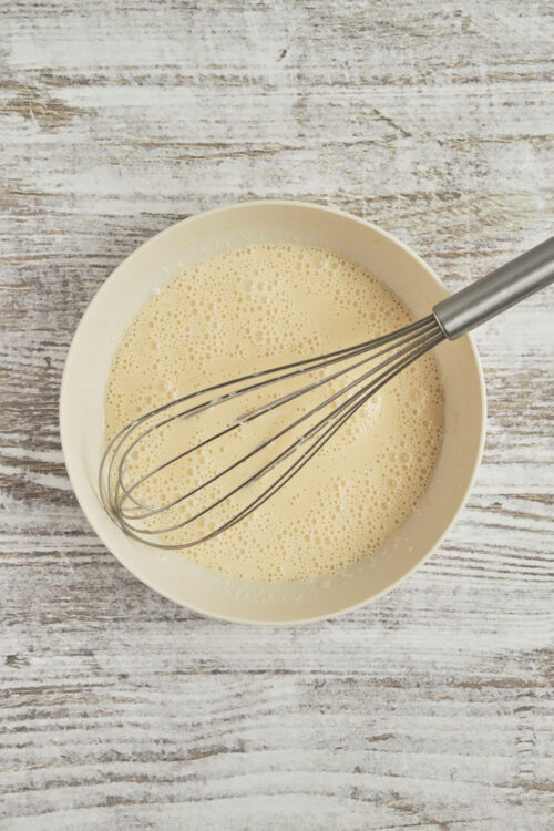 Whisking the egg and cream mixture for cr&egrave;me br&ucirc;l&eacute;e.