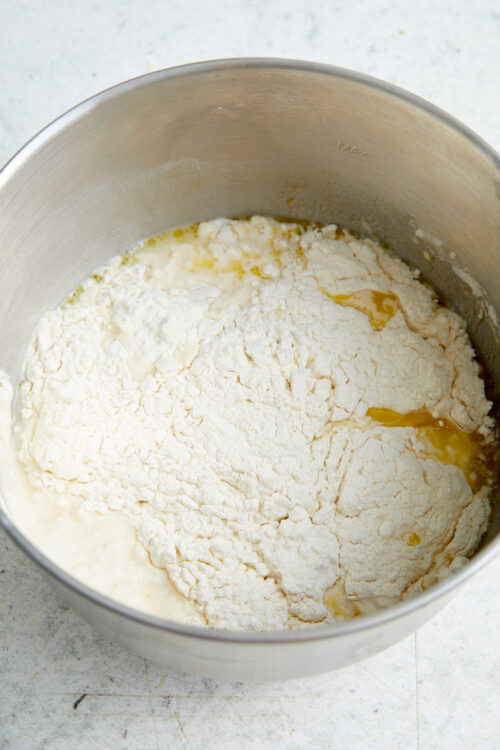 Mixing water, oil, and flour for Italian Bread dough.