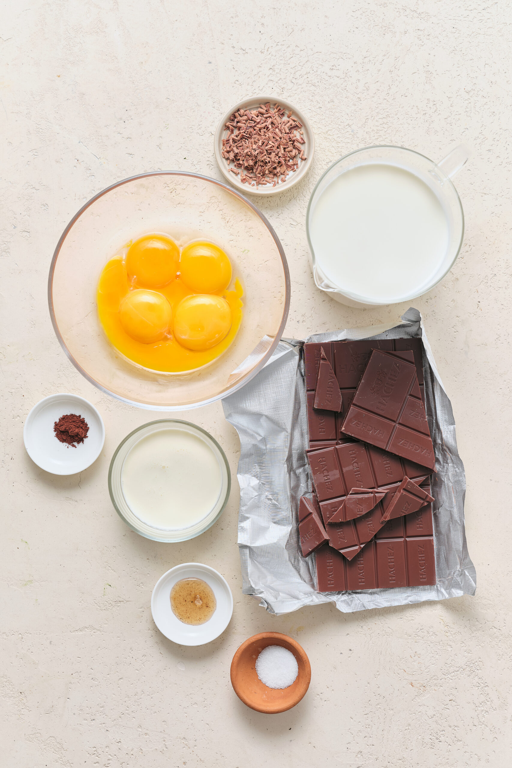 Ingredients for Pot De Cr&egrave;me: egg yolks, half-and-half, semisweet chocolate, espresso powder, vanilla extract, salt, and chocolate shavings.