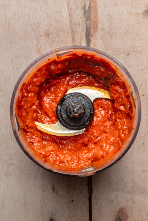 Homemade harissa paste in a food processor.